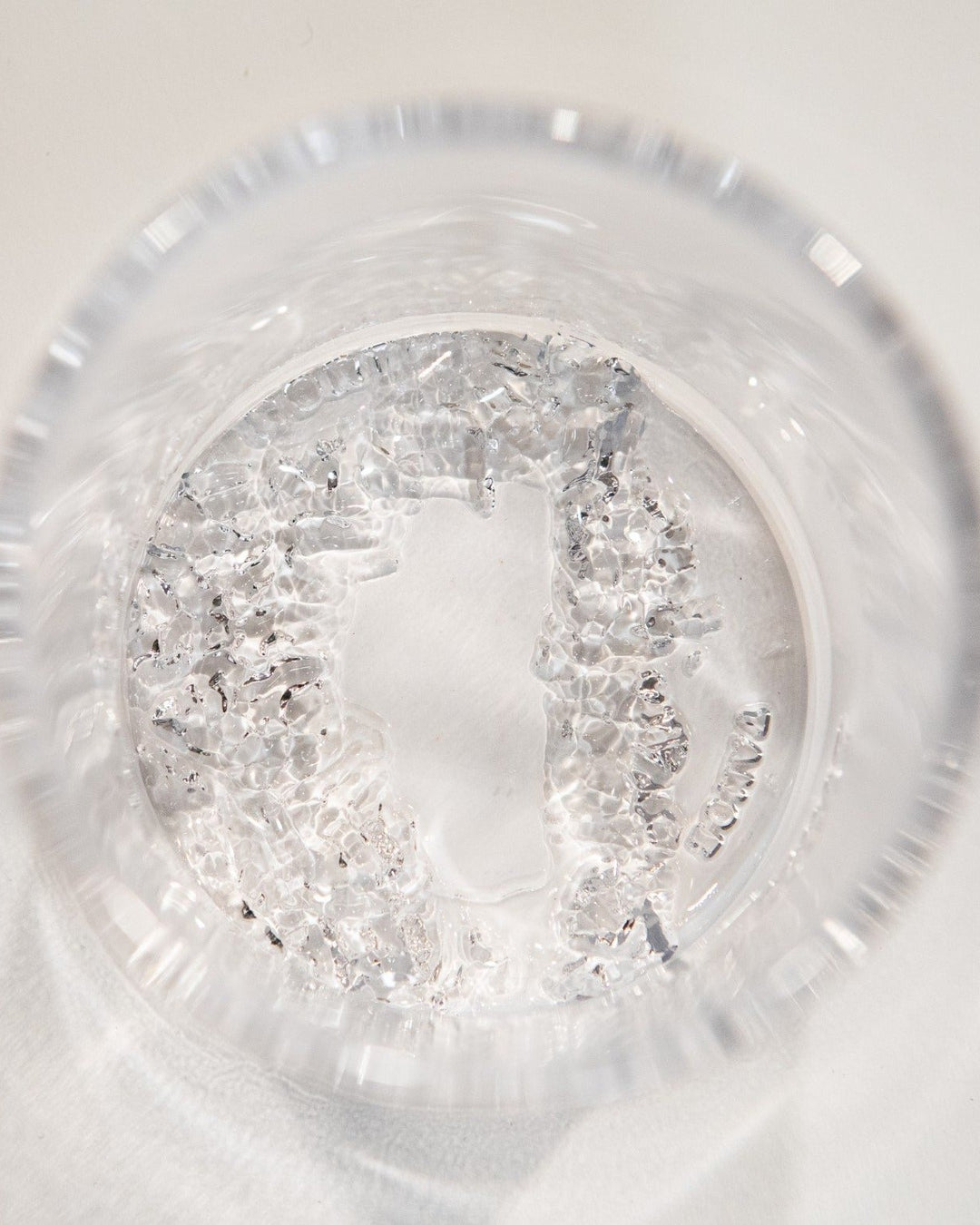 Close up of Lake Tahoe region topographic molding in glassware