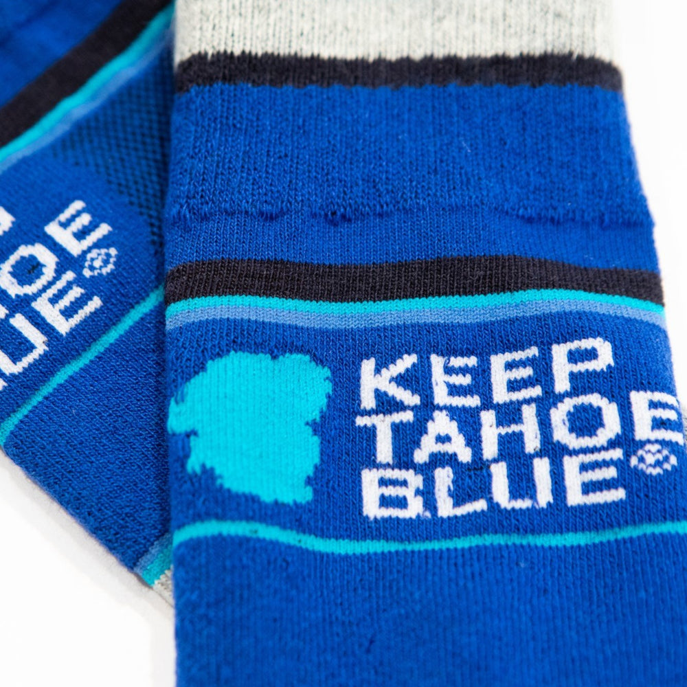 Close up logo on blue wool socks