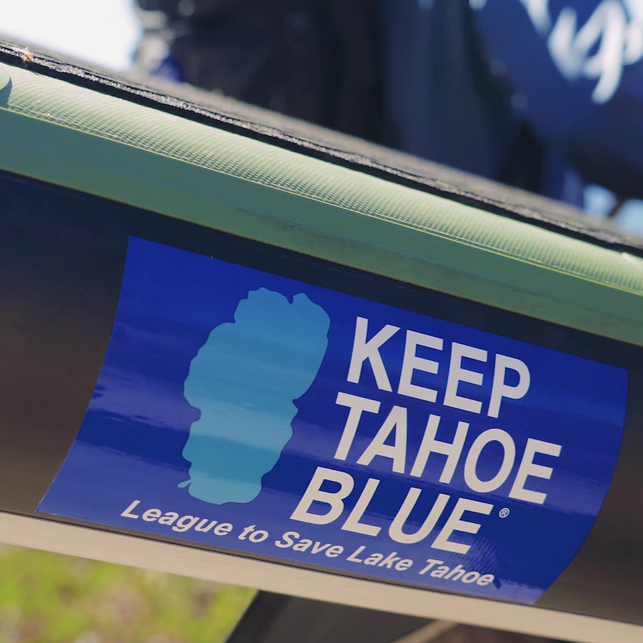 white and two tone blue classic bumper sticker on paddleboard at Lake Tahoe 